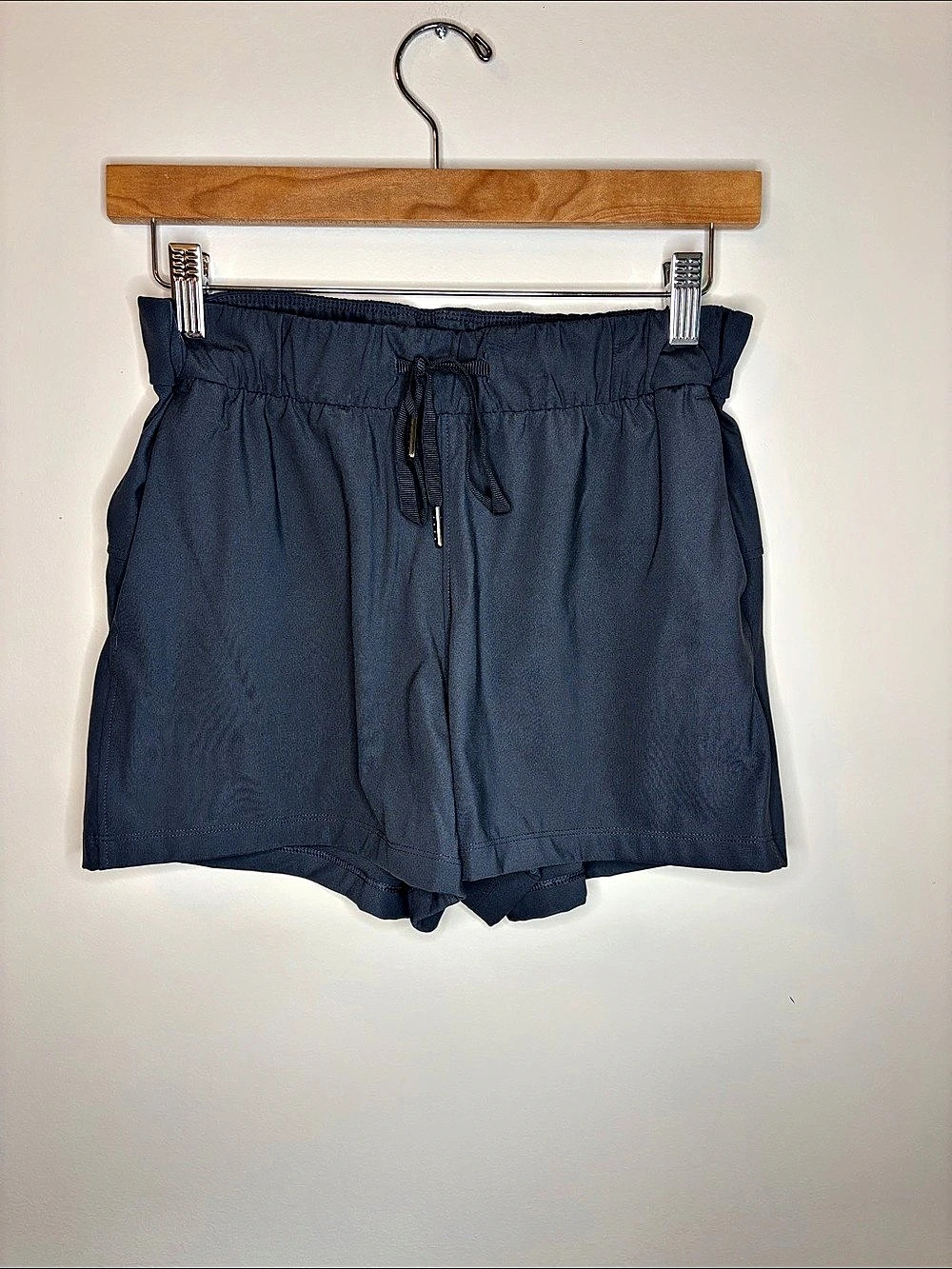 Black athletic shorts with tie